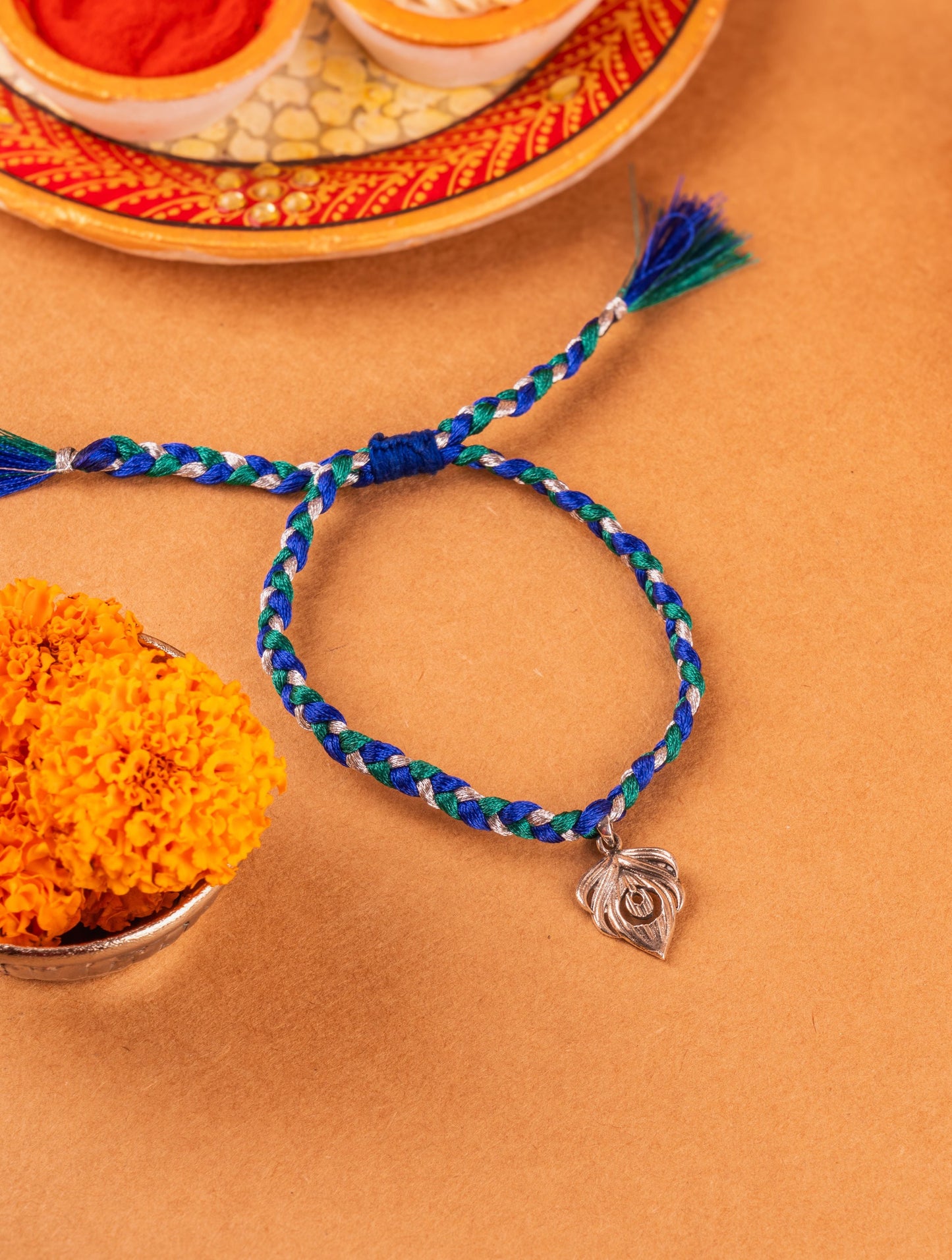 Silver Peacock Feather Lumba Rakhi